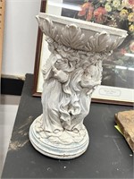 Decorative statue with open bowl top