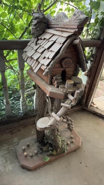 Handmade cabin tall birdhouse with climbing steps
