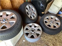 4 BMW rims and 3 tires