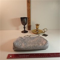 assorted items with silver purse