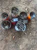 Several cans of bolts, nuts and washers