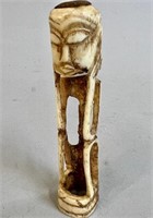 CARVED MALE FIGURE