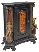 ITALIAN CABINET WITH PARCEL GILT CARVED PUTTI
