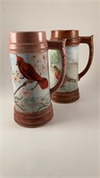 Pair of hand painted steins