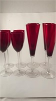 Eight red flutes