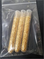 3, 3 inch vials of gold flakes