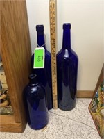 A collection of cobalt blue bottles