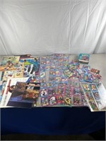 X-Men and Dragon Lance trading cards and posters