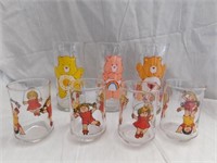 Four Cabbage Patch juice glasses - 3 Care Bears