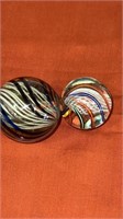 2 polished Latticino marbles 1 13/16” and 1 1/2”