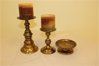 3 offset brass candle holders w/ round top