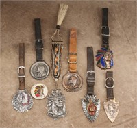 Collection of seven vintage Indianhead Watch Fobs