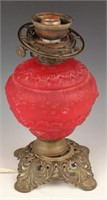 20TH CENTURY RED GLASS OIL LAMP BASE BRASS FEET
