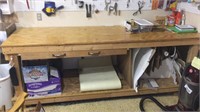 8 foot wooden workbench and contents on workbench