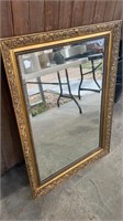 Beveled Mirror in Gold Carved Frame