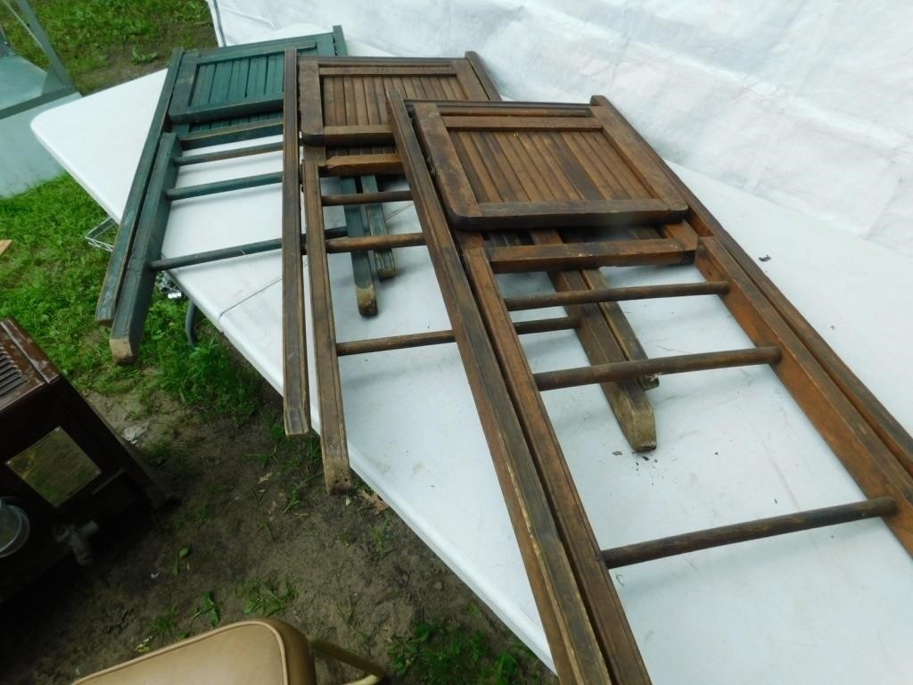 3 vintage wooden fold-up chairs.