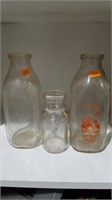 Thatcher's, farmers,and superior milk bottles
