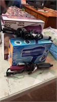 Lot of Curling Irons and Hair Dryers