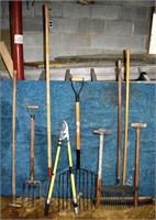 9 hand tools: forks, hammers, rake, loppers, broom
