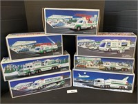 7 Hess Toy Trucks.