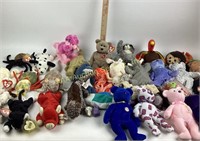 Beanie Babies includes over (25) some with tags,