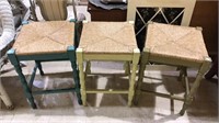 Three Rush seat barstools each one painted a
