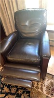 2 dark brown self reclining  leather chairs