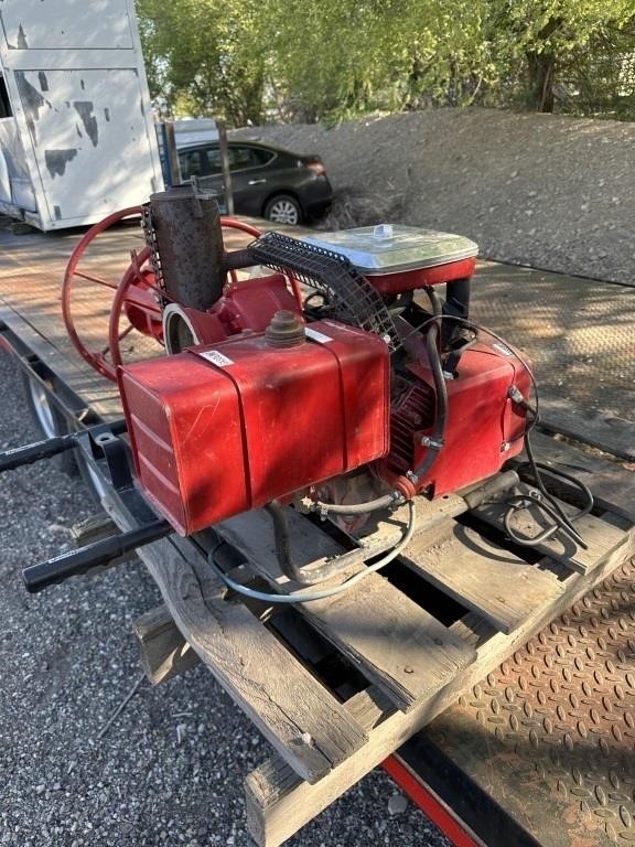 RED GAS POWERED PUMP AND HOSE REEL