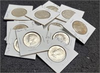 (14) 1964-D AU Kennedy Half Dollars