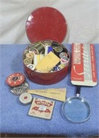Sewing accessories and magnifying glass