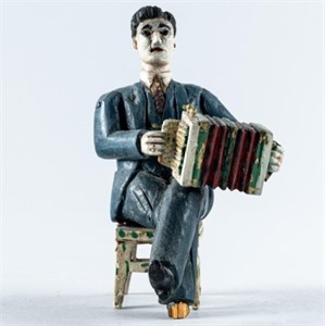CARVED ACCORDIONIST