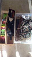 Box of extension cords, replacement bulbs