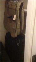 rolling suitcase and garment bag