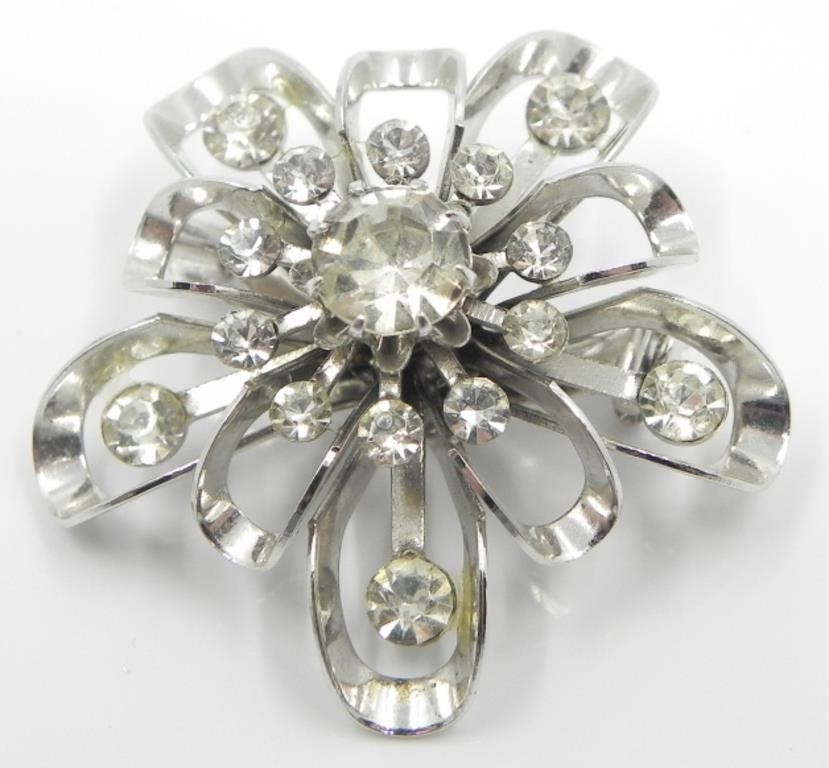 CRYSTAL RHINESTONE & SILVERTONE STARBURST BROOCH