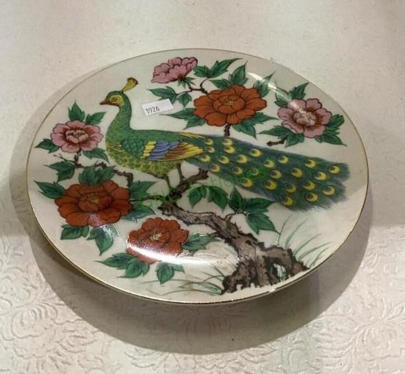 Decorative China plate with flowers and peacock