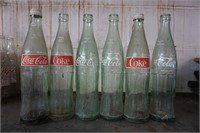 Collection of Six Coco-Cola Bottles
