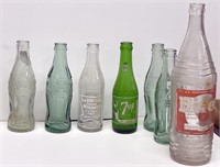 7 soda bottles: 1923 Bethlehem Coca-cola,