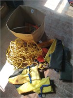 Box of boating, life vest, rope cables, air pump