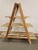 A frame shelf ladder display.  41.75in tall x