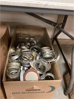 Box of canning jars , rings, and lids