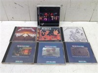 (7) Music CD's  Metallica & The Beatles Story