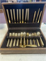Plated, flatware, gold colored 63 pieces oak box