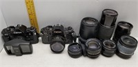 2 CANON A-1 35MM CAMERAS W/ 6 DIFFERENT LENSES