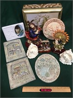 Plaques, figurines, picture frame and tin box.
