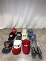 Assortment of UW badger hats, post office hats,