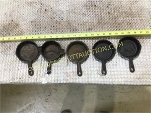5 unbranded cast iron advertising ashtrays, G