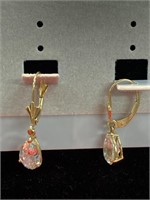 Two pair of pierced earrings. One enamel with