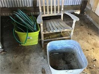 Tote w/ garden hose & wood rocking chair &
