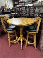 ROUND WOODEN TABLE W/ (2) SWIVEL STOOLS (TABLE