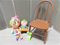 2 Dolls and an antique child's chair